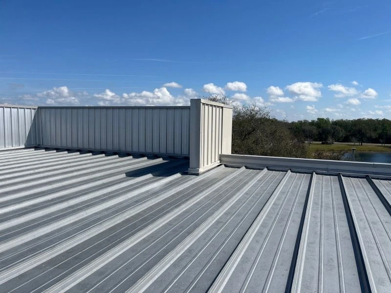 Standing seam metal roof installation, one of the most common metal systems on Florida homes.